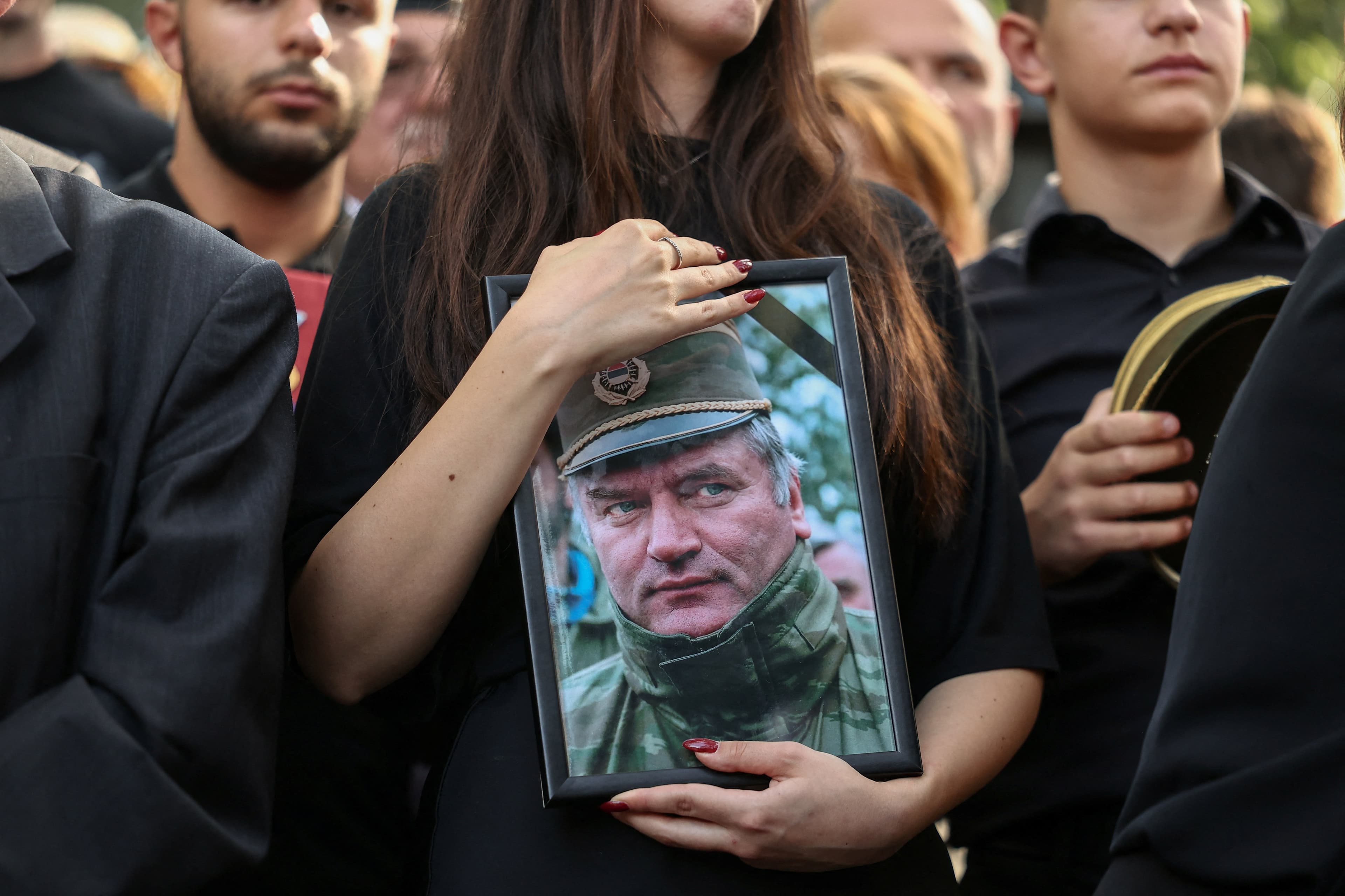 Should large funerals for convicted war criminals be allowed?