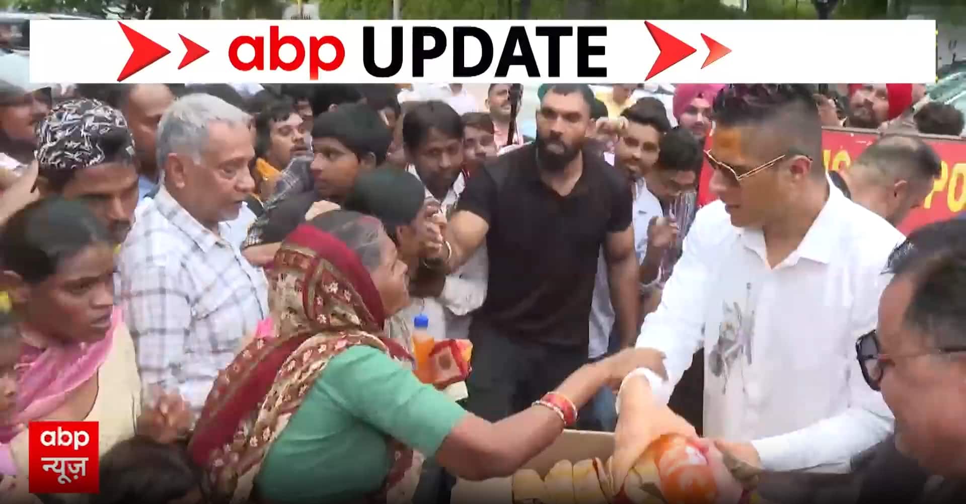 Is distributing cash alongside food a legitimate form of charity?