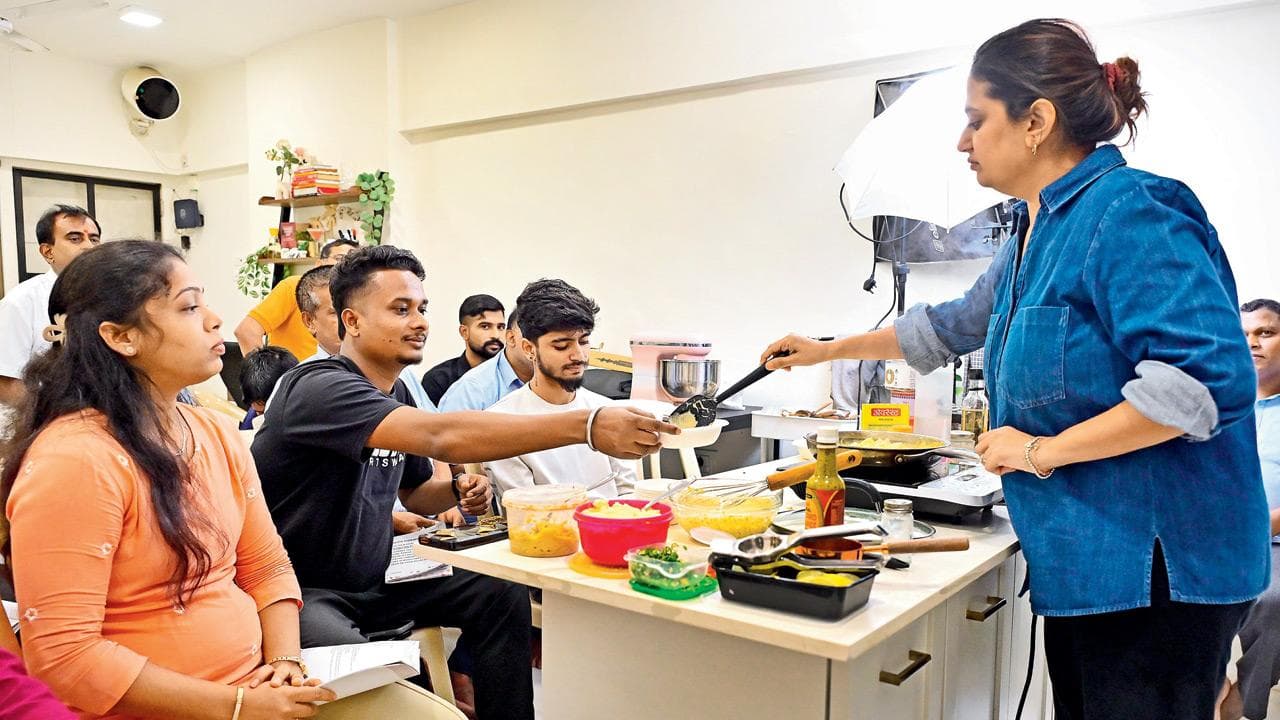 Should home cooks be expected to master international cuisines or stick to their specialty?